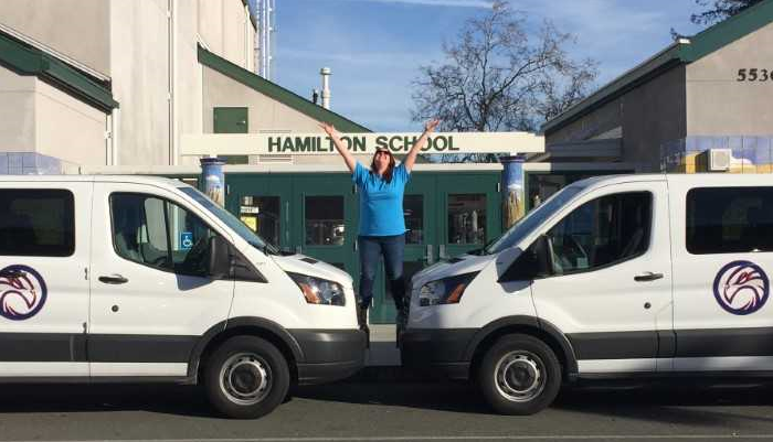 Hamilton's two school vans.